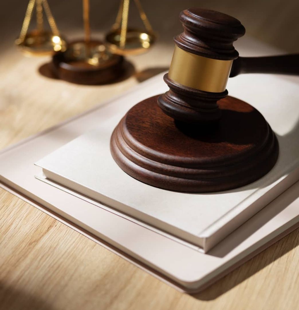 Gavel and legal documents on desk